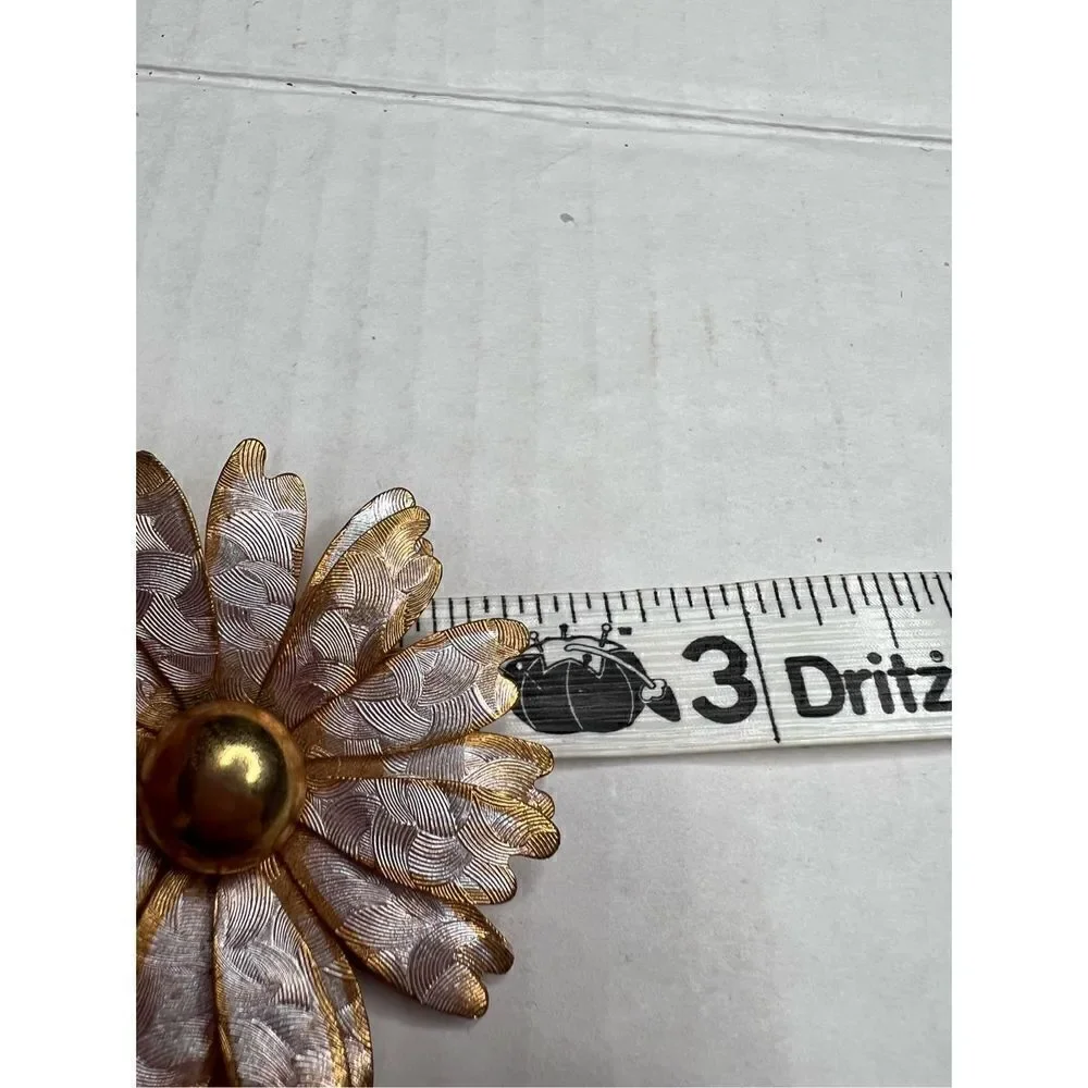 Vintage floral gold and silver tone brooch